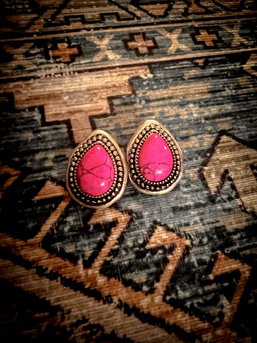 The Pink Rolling Stone Studs